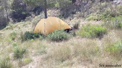 Tourist hears loud moaning and catches couple fucking in the tent