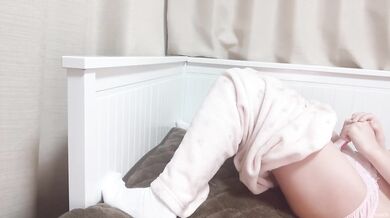 A Japanese girl in pajamas whimpers and squirts her thick cum loud