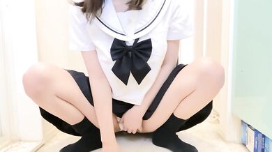 Asian cosplay slut squirts in her soaked uniform