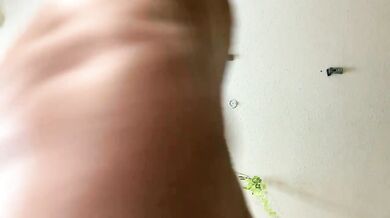 Her ebony soles glisten as she worships her painted toes
