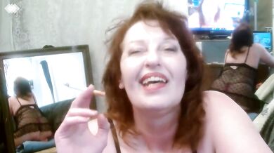 Big ass redhead smokes in polkadot panties with natural tits