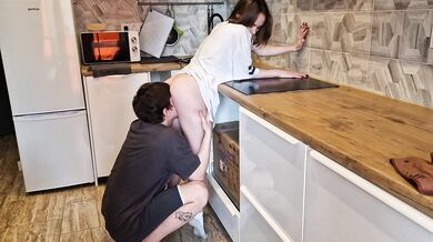 Cute girl deepthroats while getting pounded doggystyle in kitchen