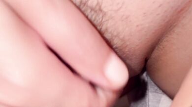 She openly rubs her shaved pussy wet climaxing fast